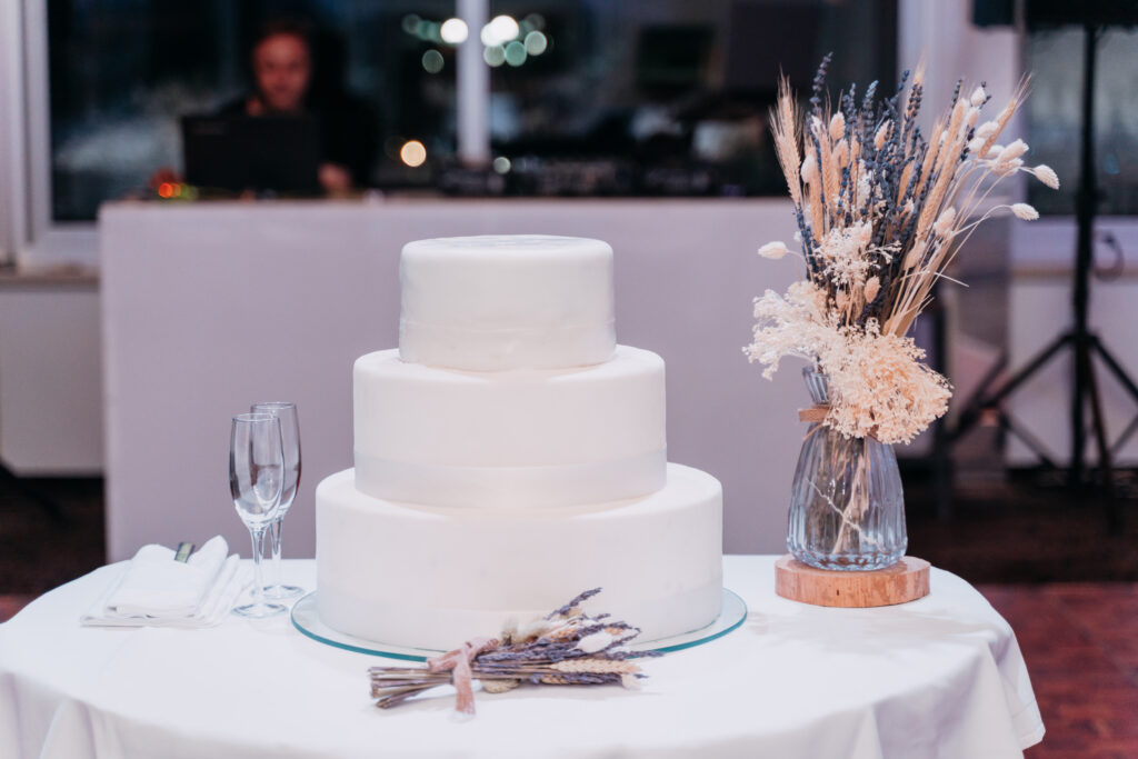 Minimal and romantic photo of Wedding cake in hotel venue.